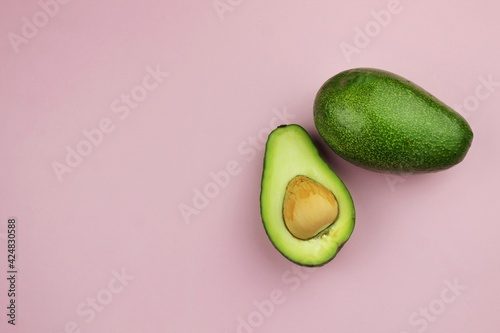 avocado on a pink background 