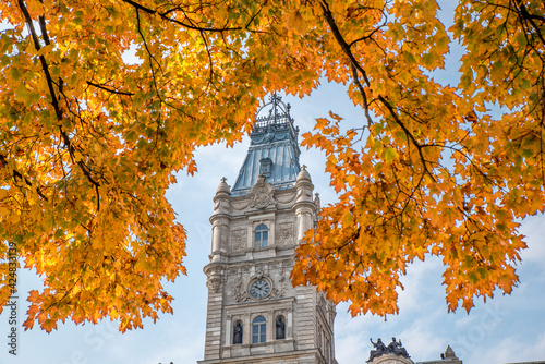Quebec parliament in autumn with colorful maple tree, Quebec City, Canada