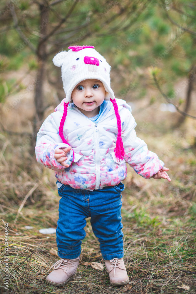 Portrait of little toddler girl having fun outdoors in cold weather at mountains Portrait of little toddler girl having fun outdoors in cold weather at mountains