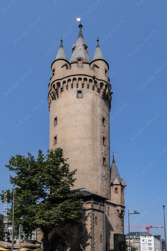 Eschenheim Tower (Eschenheimer Turm) was a city gate, part of medieval fortifications of Frankfurt am Main - a landmark of city. Tower erected at beginning of XV century. Frankfurt am Main, Germany.