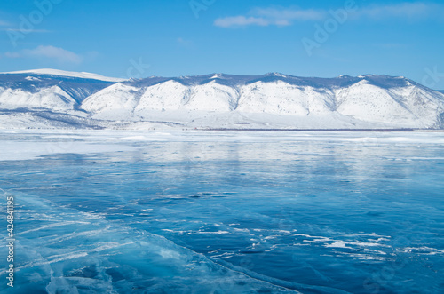 Ice surface of Baikal lake. Winter christmas landscape