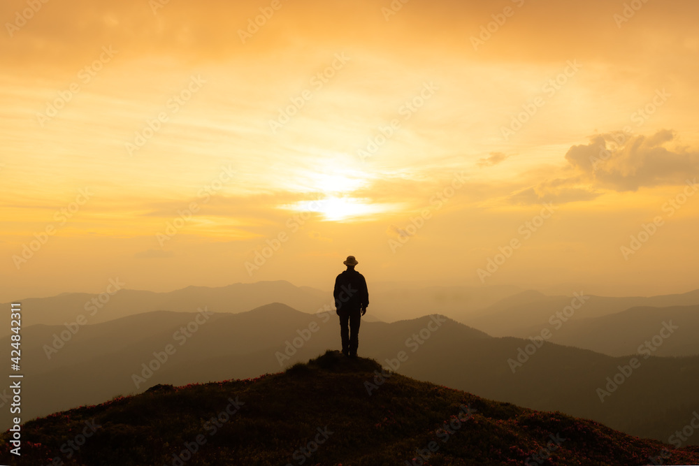 Alone tourist on the edge of the cliff Alone tourist on the edge of the cliff