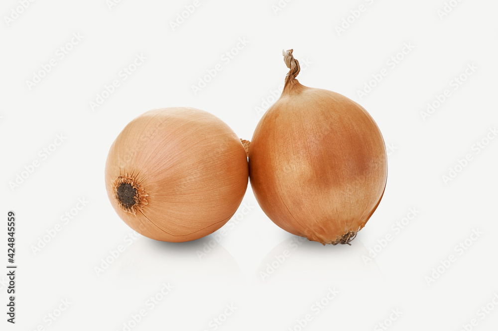 Fototapeta premium Two onions isolated on a white background.