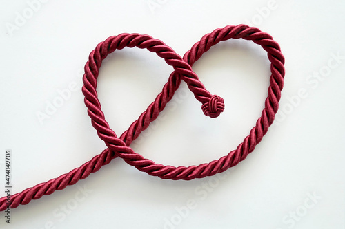 Twisted Red Rope Tied into Heart