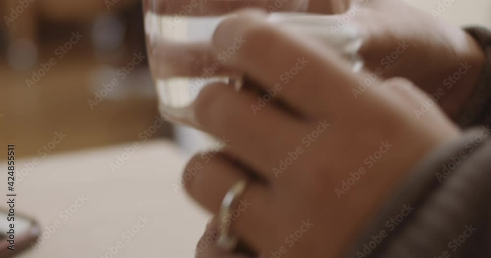 Woman Holding Bottle Of Pills And Drinking Water Woman Holding Bottle Of Pills And Drinking Water