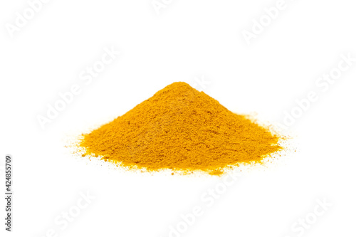 Curcuma powder isolated on white background. Heap of turmeric