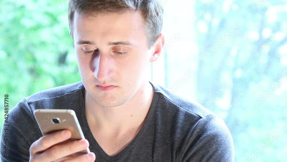 Man busy using smart phone, close-up
Man busy using smart phone, close-up