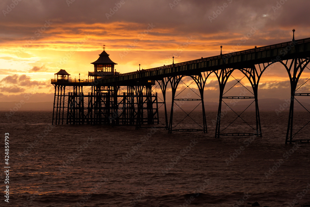 sunset on the beach ,pier, clevedon ,old pier ,England 