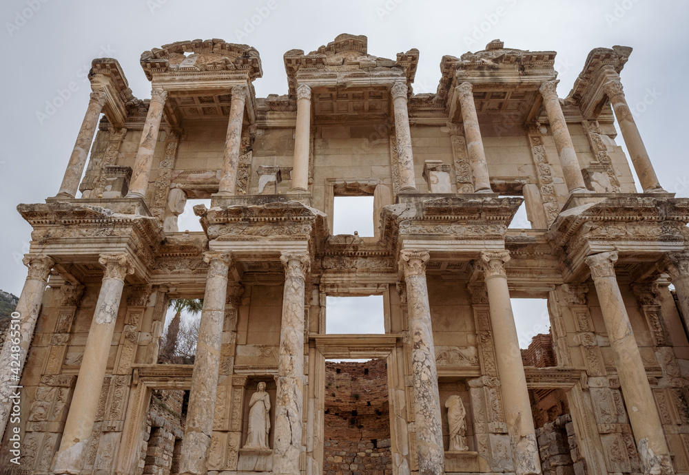 detail of Celsus Library from low angle view in Ephesus ruins, historical ancient Roman archaeological sites in eastern Mediterranean Ionia region, Selcuk, Izmir, Turkey - 03.09.2021.