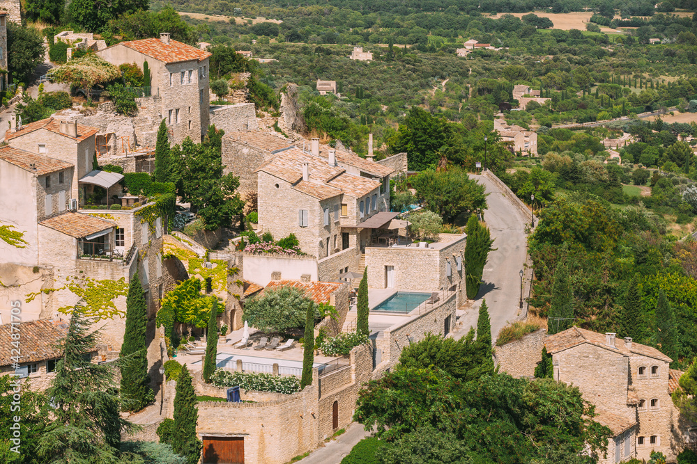Gordes, Provence, France. Beautiful Scenic View Of Medieval Hilltop Village Of Gordes. Sunny Summer Sky. Famous Landmark.