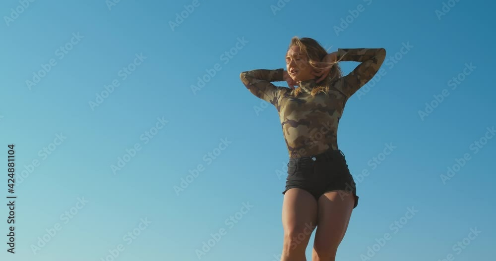 Pretty model is posing in the middle of the desert, windy, Great Sandy Desert 4k Pretty model is posing in the middle of the desert, windy, Great Sandy Desert 4k