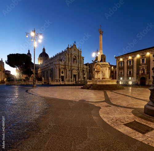 Illuminated Piazza Duomo, Catania, Sicily, Italy in the evening. Cathedral of Santa Agatha and Liotru, symbol of Catania in the evening
