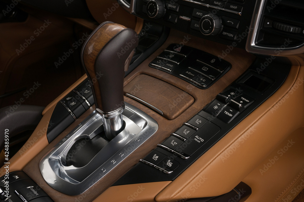 Sport car interior background. Automatic transmission in modern luxury car.