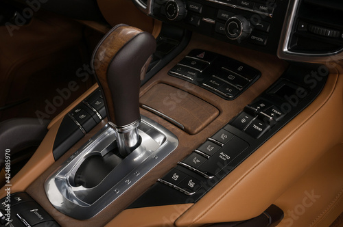 Sport car interior background. Automatic transmission in modern luxury car.