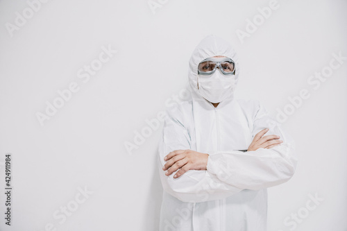 doctor with mask and security suit , covid , on a side 