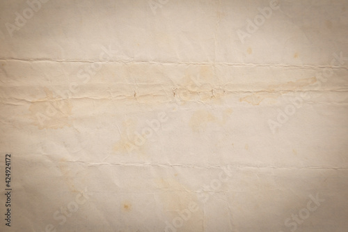 Recycled crumpled brown paper texture or paper background for design with copy space for text or image