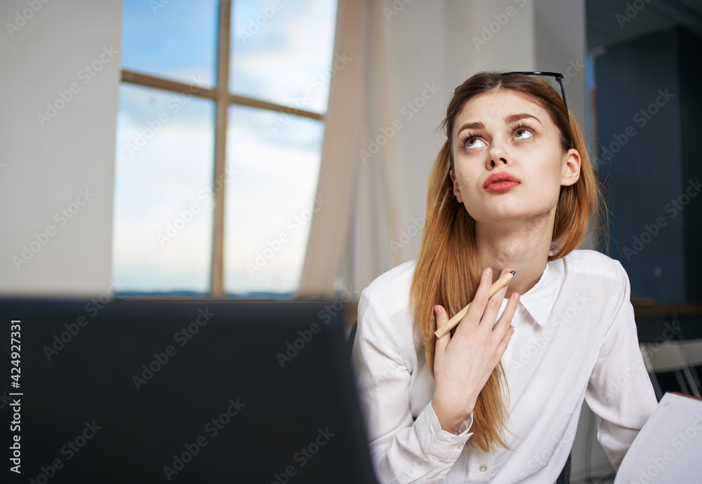 Woman secretary working desk laptop emotions office professional manager Woman secretary working desk laptop emotions office professional manager