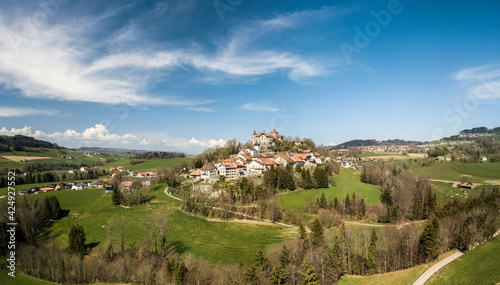 Obraz na plátně Aerial image of Castle of Rue (built in 12th century) and the town on a rock pro