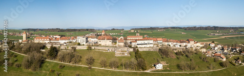 Aerial panorama image of old Swiss town Romont, built on a rock prominence, in Canton Freibourg, Switzerland photo