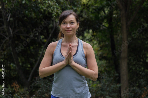 Fototapeta Naklejka Na Ścianę i Meble -  Woman on yoga practice in the nature 