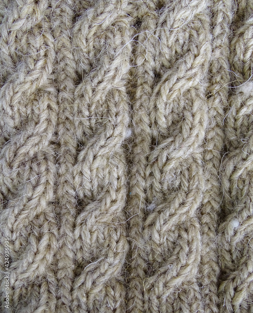 Handmade brown knitting wool cables, knitted texture