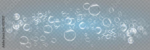 Set of realistic colorful soap bubbles. Transparent realistic soap bubbles isolated on transparent background.