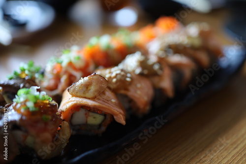 Overhead japanese sushi food. Top view of assorted sushi. Rainbow sushi roll.