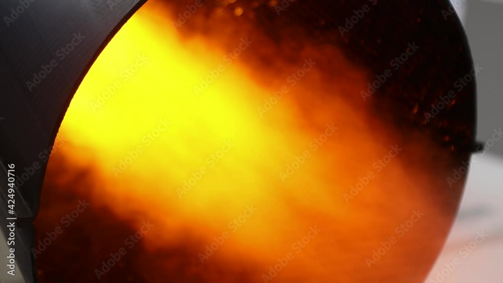 bright fire bursts from the rocket engine nozzle