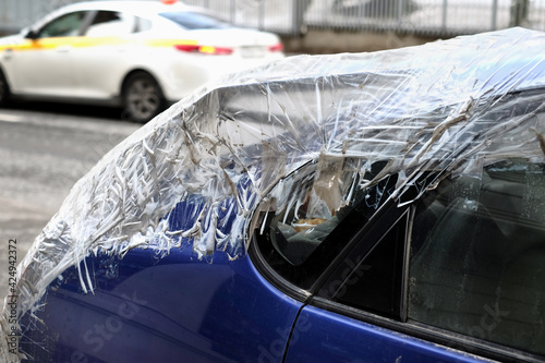 car wrapped in cellophane