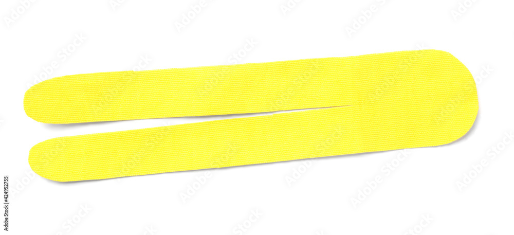 Yellow kinesio tape piece on white background, top view Yellow kinesio tape piece on white background, top view