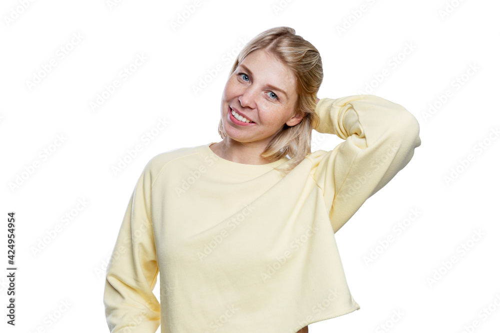 Smiling young woman in a yellow sweater. Isolated on white background. Smiling young woman in a yellow sweater. Isolated on white background.