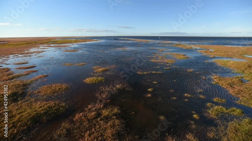 imelapse , north island in summer with low clouds t photo