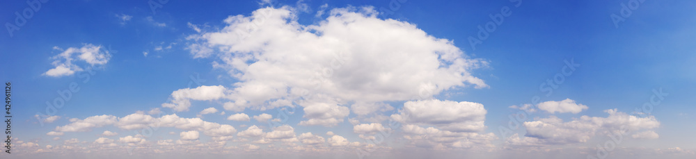 Wide sky panorama with scattered cumulus clouds Wide sky panorama with scattered cumulus clouds