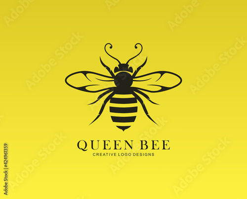 Graphic illustration of silhouette honey bee. Isolated on yellow background vector drawing for honey products, package, design photo