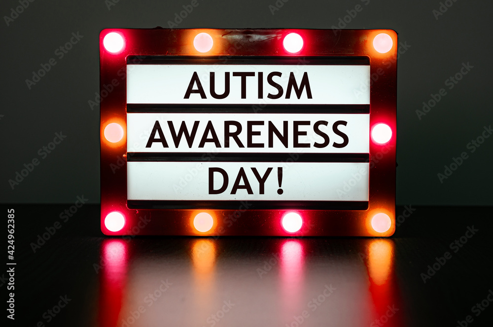 Lightbox with red lights with words - Autism awareness day! World Autism Awareness Day is an internationally recognized day on 2 April every year.