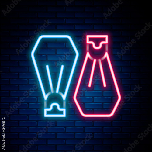 Glowing neon line Rubber flippers for swimming icon isolated on brick wall background. Diving equipment. Extreme sport. Sport equipment. Colorful outline concept. Vector