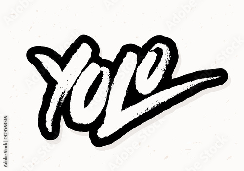 Yolo. You only live once. Vector handwritten lettering. photo