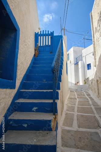 An alley and traditional residential houses in the village of Ios Greece, also known as Chora © DIMITRIOS