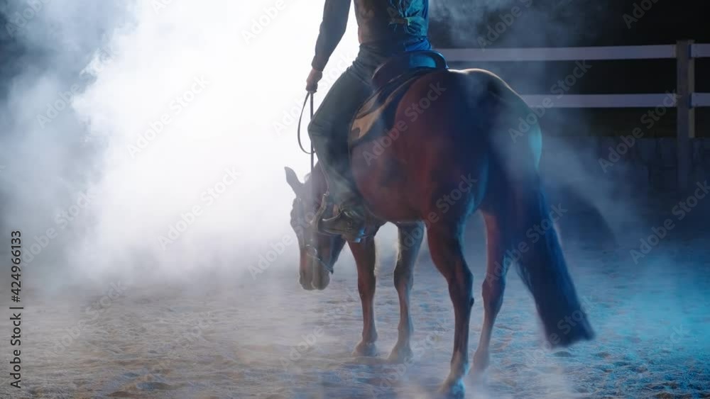 Western horse spin in smoke at night with backlight 4K