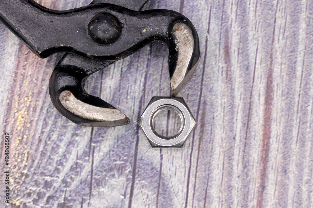 old rusty repair tools on wooden background old rusty repair tools on wooden background