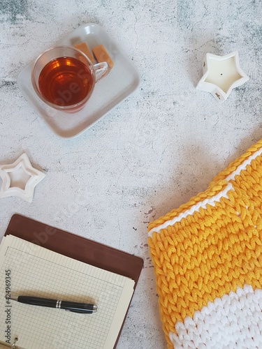 tea drinking, cup and teapot with tea on gray background, copy space
