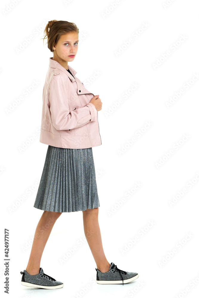 Pretty fashionable stylish teenage girl. Photo session in the studio Pretty fashionable stylish teenage girl. Photo session in the studio