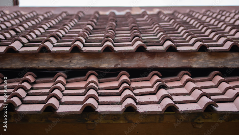 Fototapeta premium Pottery tile as the roof of a house. Genteng is traditional roof from Indonesia.