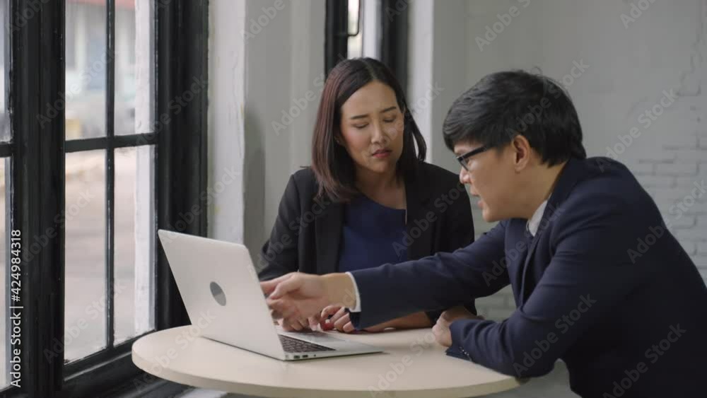Man and woman arguing disagreeing about bad business contract, colleagues having conflict dispute about document sitting at office desk, partners shouting breaking agreement with unacceptable terms Man and woman arguing disagreeing about bad business contract, colleagues having conflict dispute about document sitting at office desk, partners shouting breaking agreement with unacceptable terms