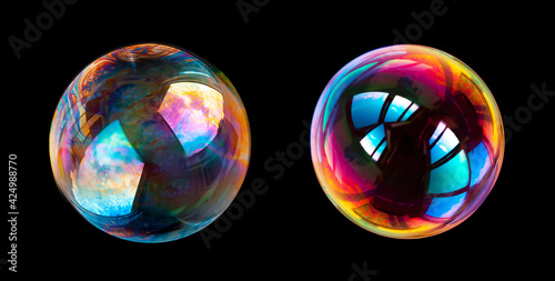 Group of soap bubbles isolated on black background.
