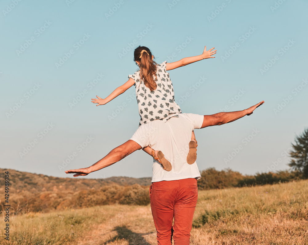 child family outdoor man father girl happy happiness lifestyle having fun bonding piggyback daughter child family outdoor man father girl happy happiness lifestyle having fun bonding piggyback daughter
