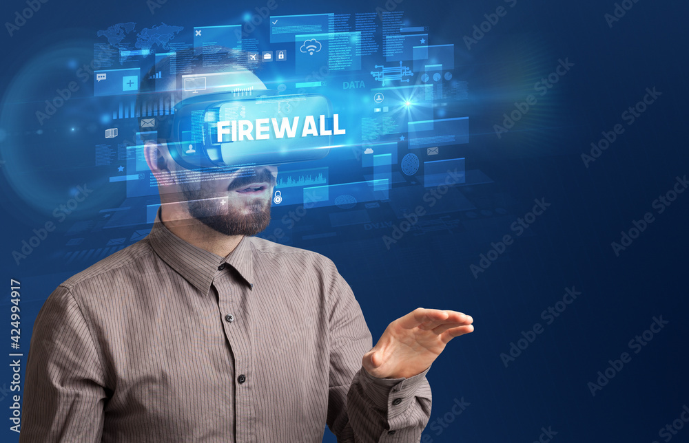 Businessman looking through Virtual Reality glasses Businessman looking through Virtual Reality glasses
