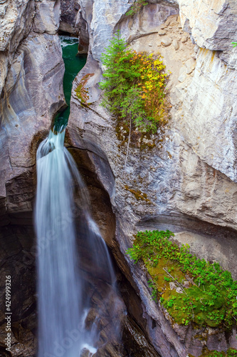 Magnificent waterfall in Maligne canyon