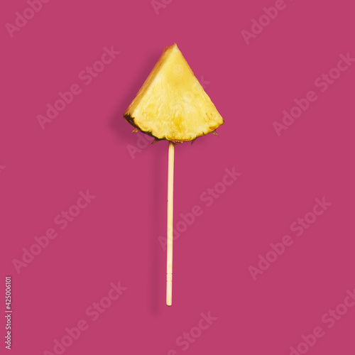 slice of a pineapple on a stick