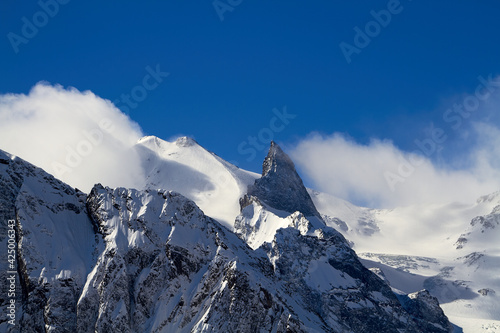 Beautiful snowy mountains and blue sky, fang Sufruju Dombai Karachay-Cherkessia